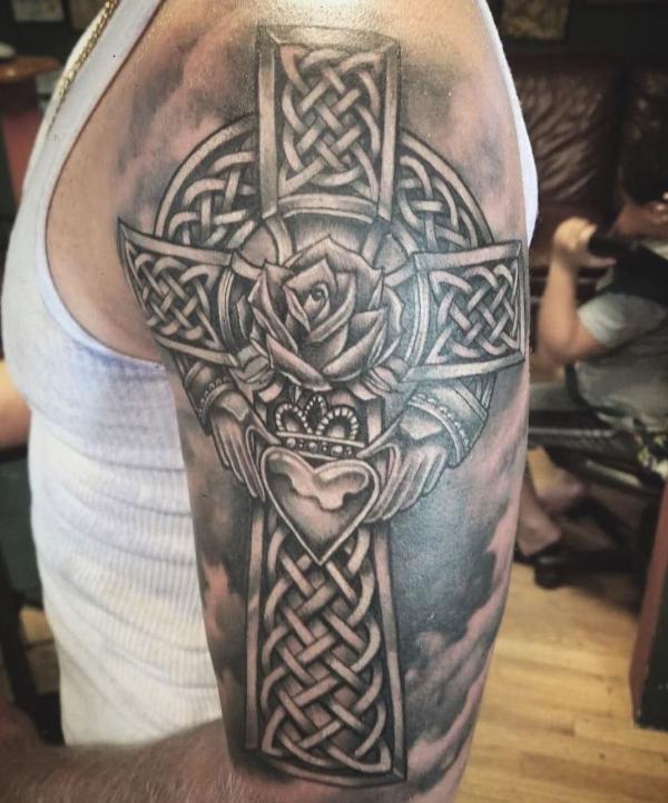 Celtic cross with claddagh and rose tattoo black and grey