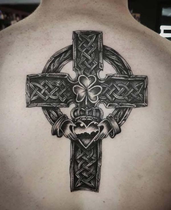 Celtic cross with claddagh and shamrock tattoo on back