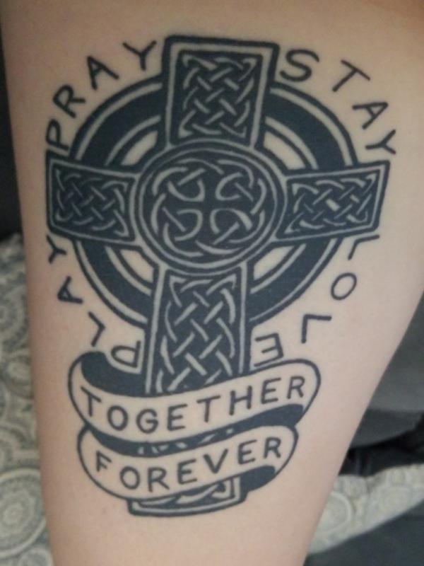 Celtic cross with phrases Play Pray Stay Love Together Forever tattoo