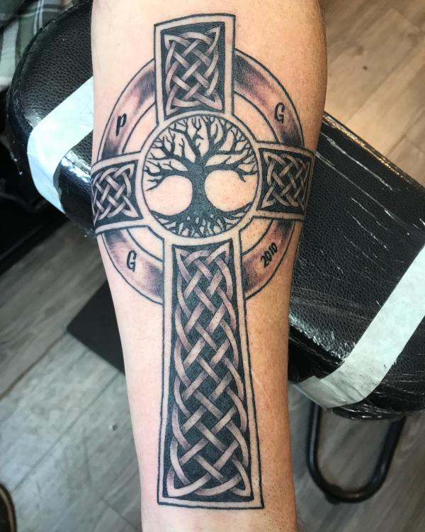Celtic cross with tree of life forearm tattoo