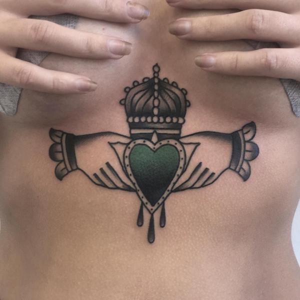 Claddagh sternum tattoo