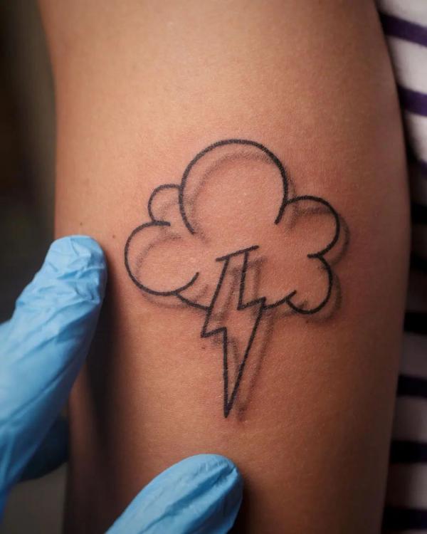 Cloud and lightning bolt outline tattoo