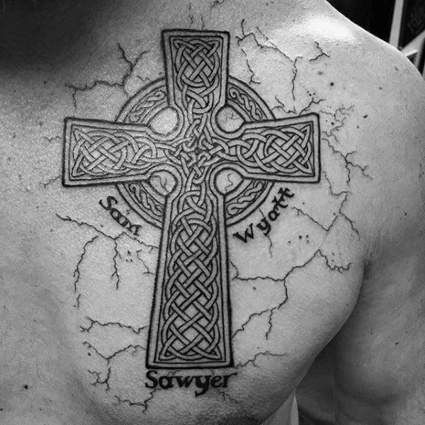Cracked skin Celtic cross with names tattoo on chest