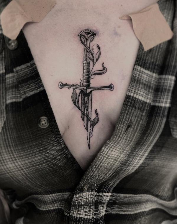 Dagger cross sternum tattoo