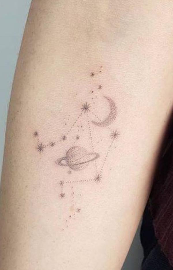 Dainty Libra constellation with planet and moon tattoo