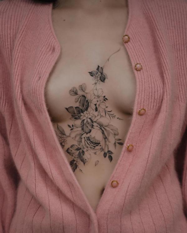 Dainty peony and forget ne not sternum tattoo