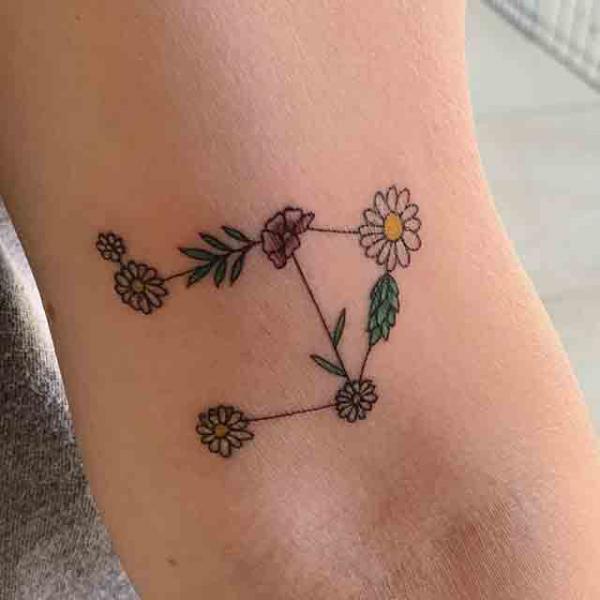 Daisy libra constellation tattoo