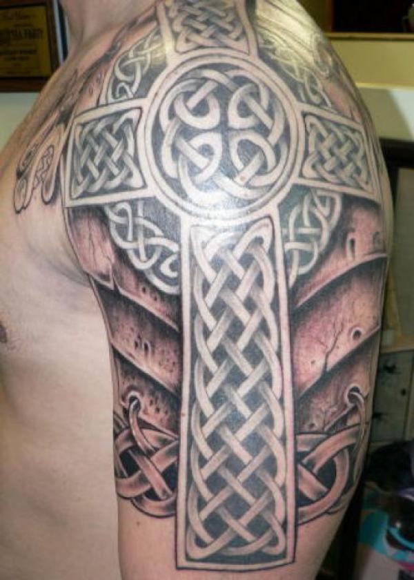 Dark Celtic cross with Dana shield shoulder arm tattoo