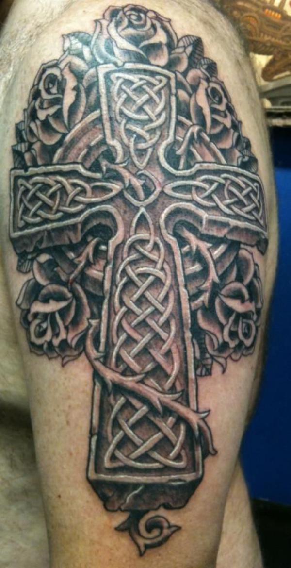 Dark Celtic cross with roses tattoo