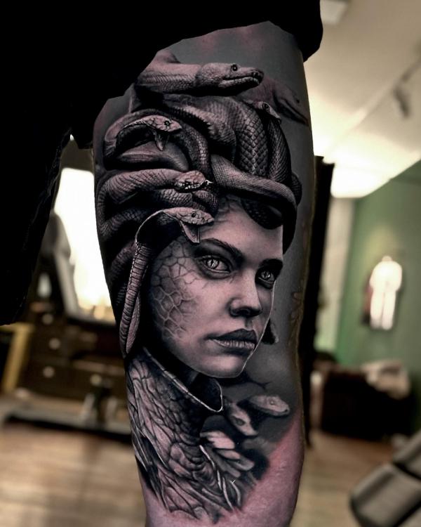 Dark Medusa thigh tattoo
