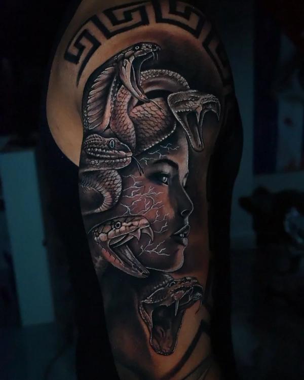 Dark medusa half sleeve tattoo