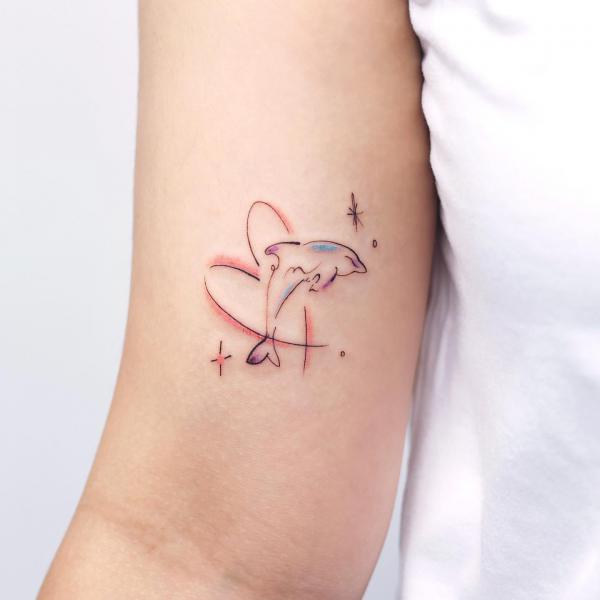 11 Beautiful And Elegant Dolphin Tattoo Ideas For Women