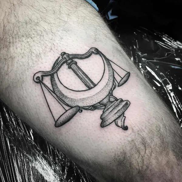 Dotwork Libra scales with crescent moon tattoo