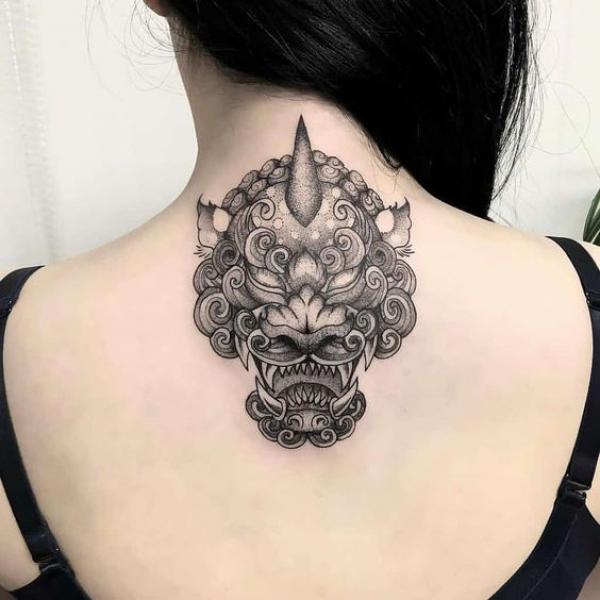 Dotwork foo dog nape tattoo