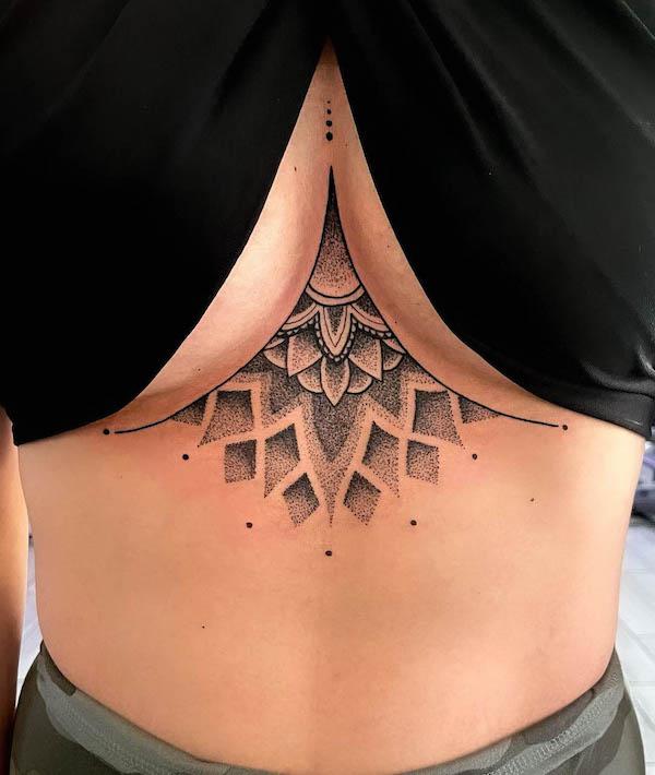 Dotwork mandala sternum tattoo