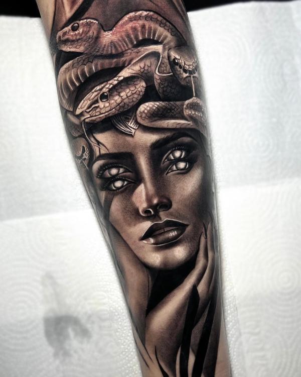 Double eyes Medusa tattoo half sleeve