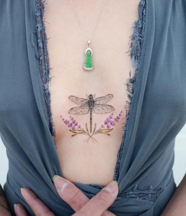 Dragonfly with lavender sternum tattoo