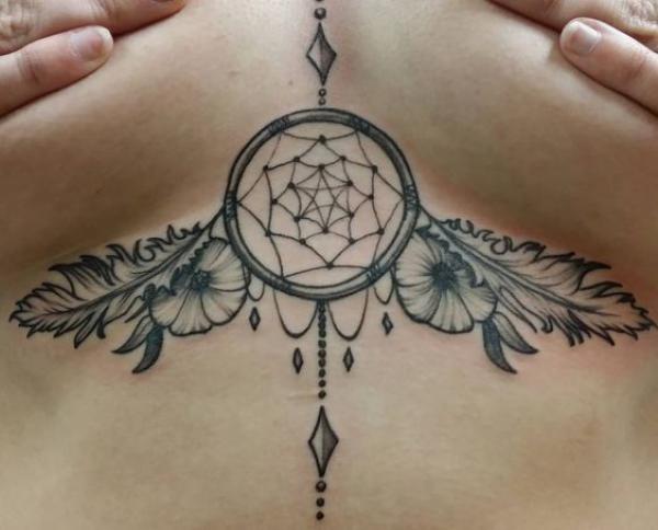 Dream catcher with feathers sternum tattoo