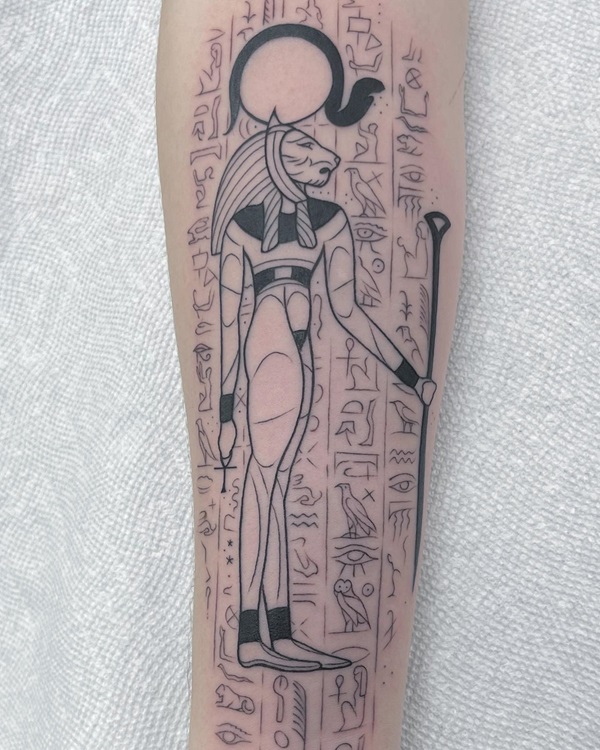 Egyptian god Sekhmet and Hieroglyphics tattoo