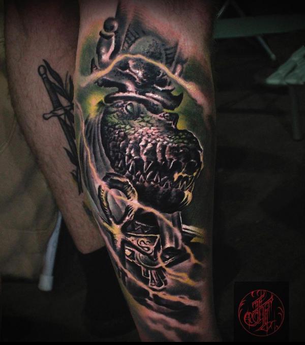 Egyptian god sobek calf tattoo