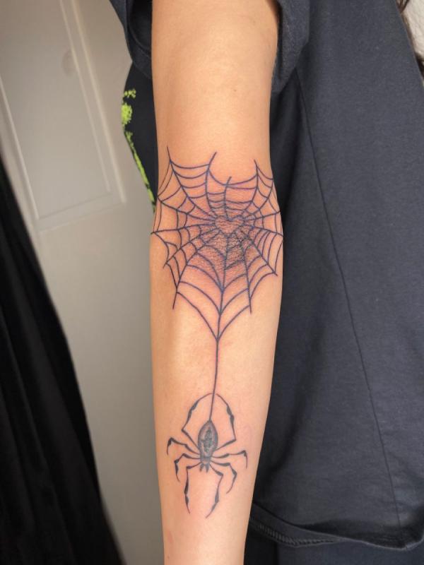 Elbow heart spiderweb with spider tattoo