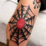 Elbow spiderweb tattoo old school