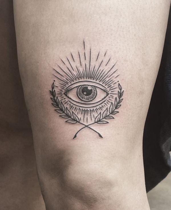 Evil Eye Tattoo Above Knee