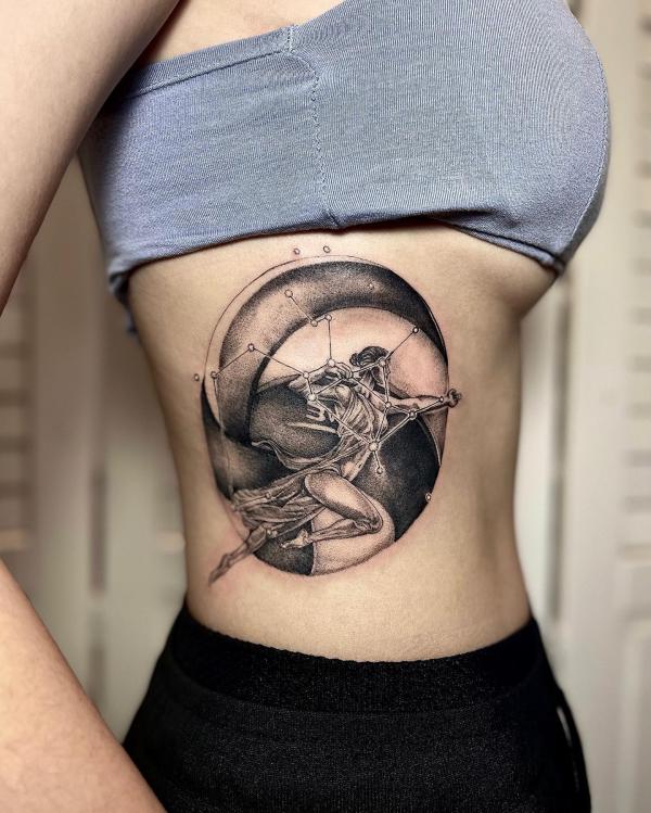 Female Sagittarius constellation and crescent moon tattoo