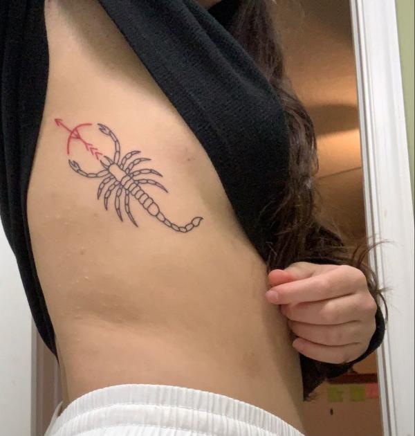 Feminine sagittarius and scorpio line work tattoo