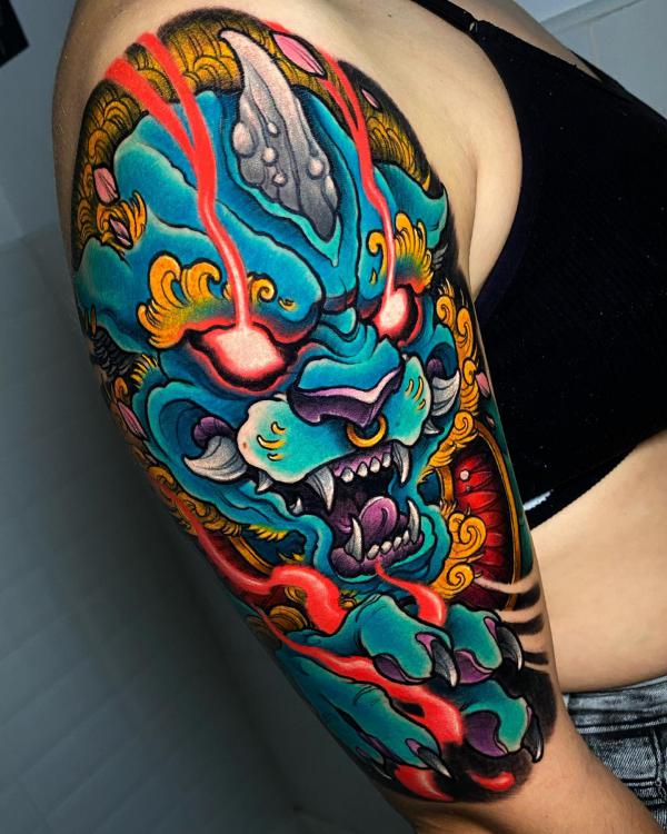 Flaming blue foo dog tattoo