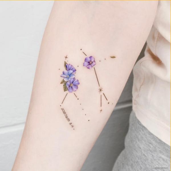 Floral gemini constellation tattoo