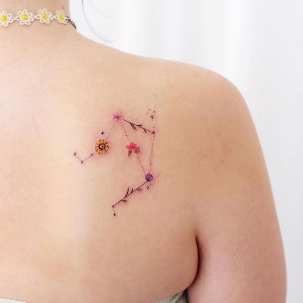 Flower Libra constellation shoulder blade tattoo