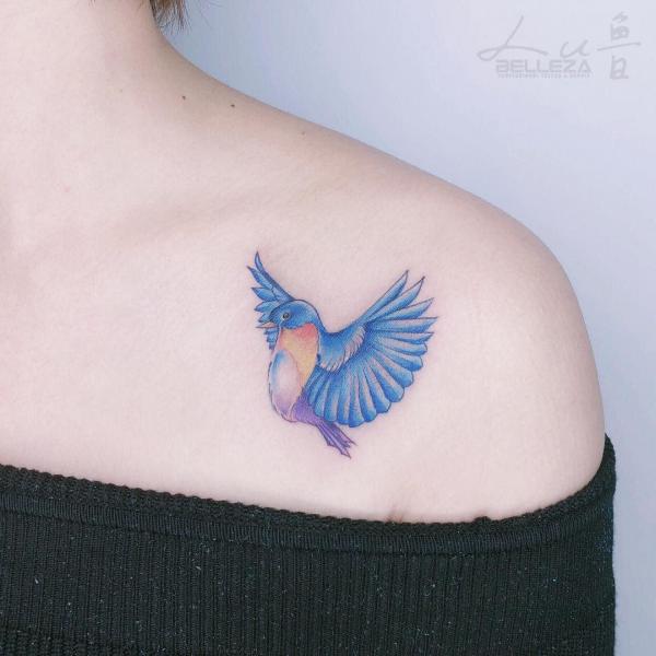 Flying Blue Jay clavicle tattoo