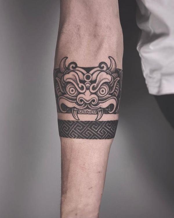 Foo dog armband tattoo