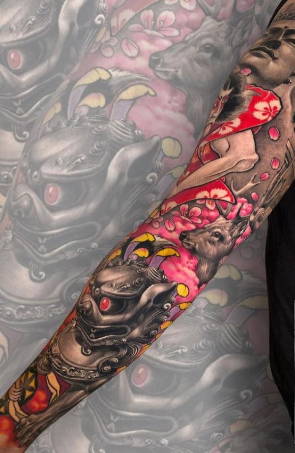 Foo dog and deer tattoo sleeve
