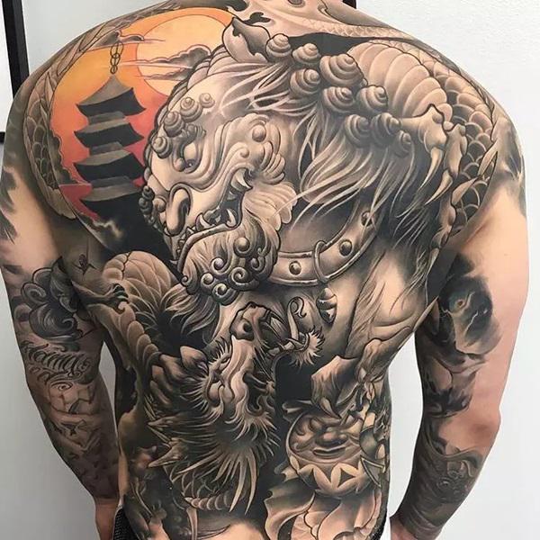 Foo dog and dragon full back tattoo