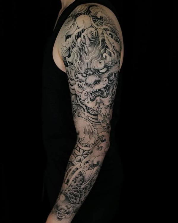 Foo dog and koi full sleeve tattoo