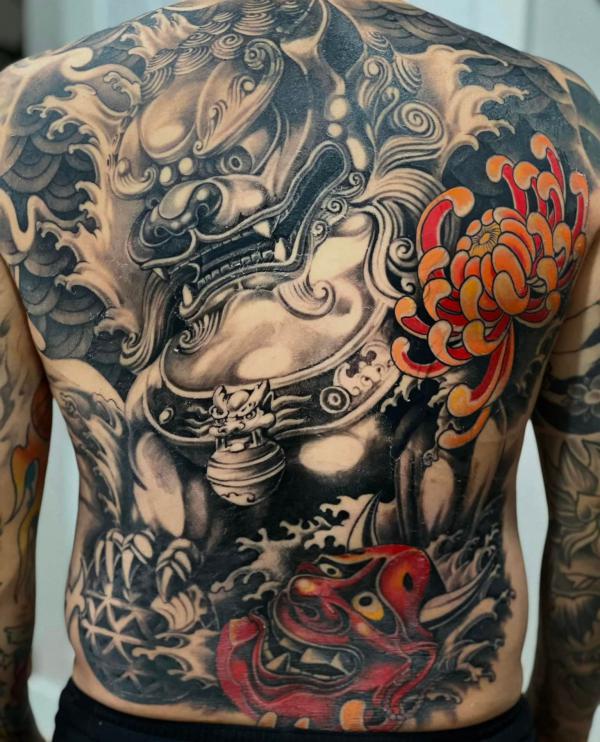 Foo dog and oni with chrysanthemum full back tattoo