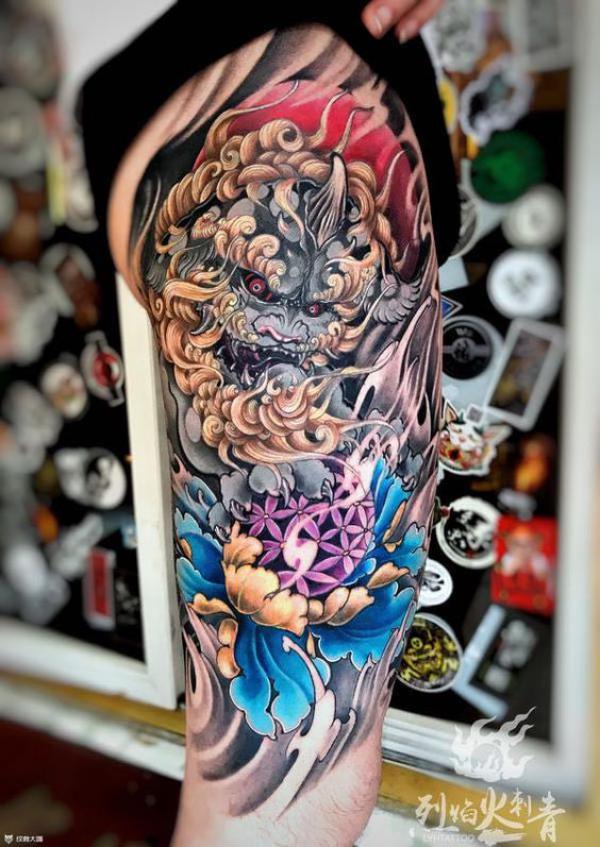 Foo dog and peony with flower of life tattoo