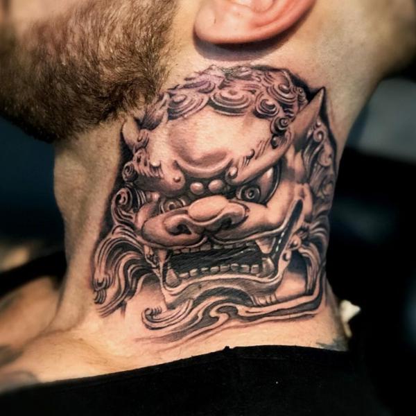 Foo dog neck tattoo