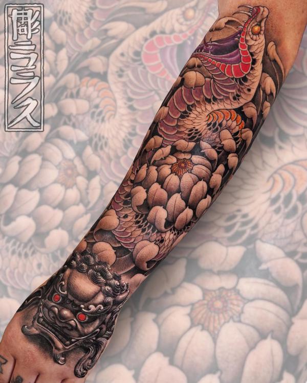 Foo dog snake with chrysanthemum tattoo