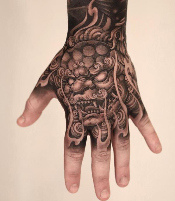 Foodog hand tattoo