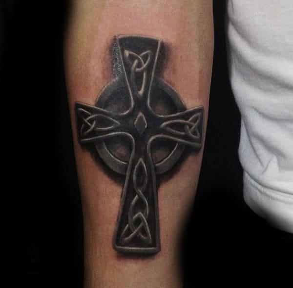 Forearm backwork Celtic cross tattoo