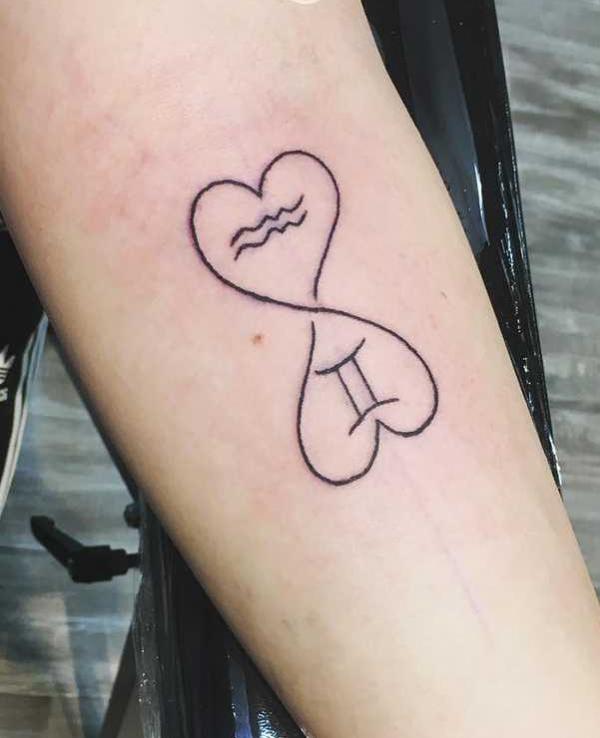 Gemini and aquarius line work tattoo