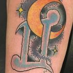Gemini and crescent moon tattoo