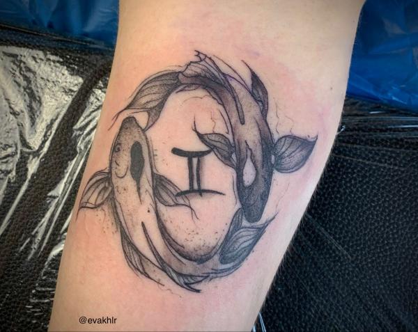 Gemini and koi fish Pisces tattoo