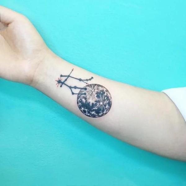 Gemini constellation and Mercury tattoo