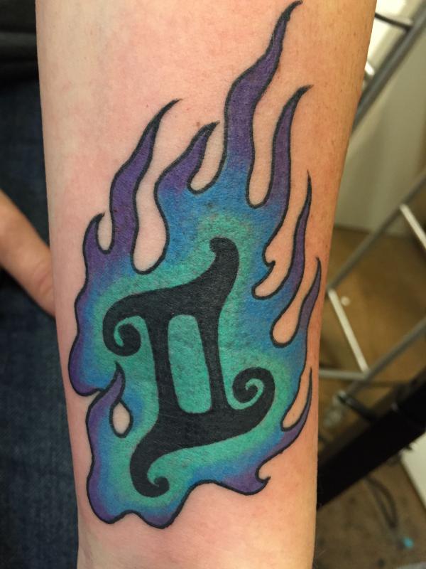 Gemini fire tattoo