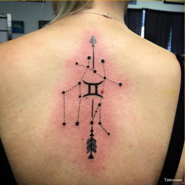 Gemini glyph and constellation with arrow tattoo