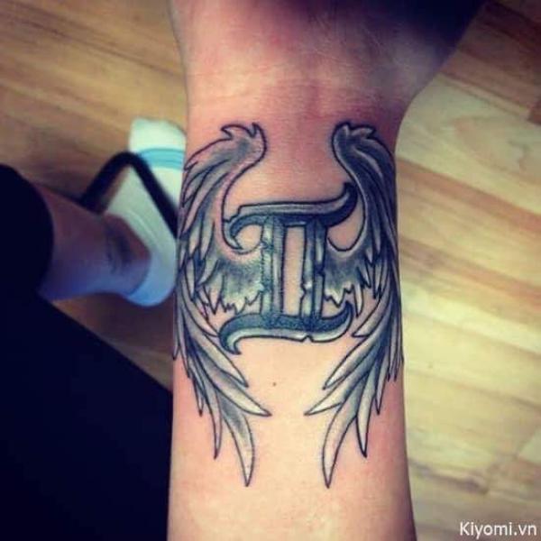 Gemini glyph with Angel wings tattoo